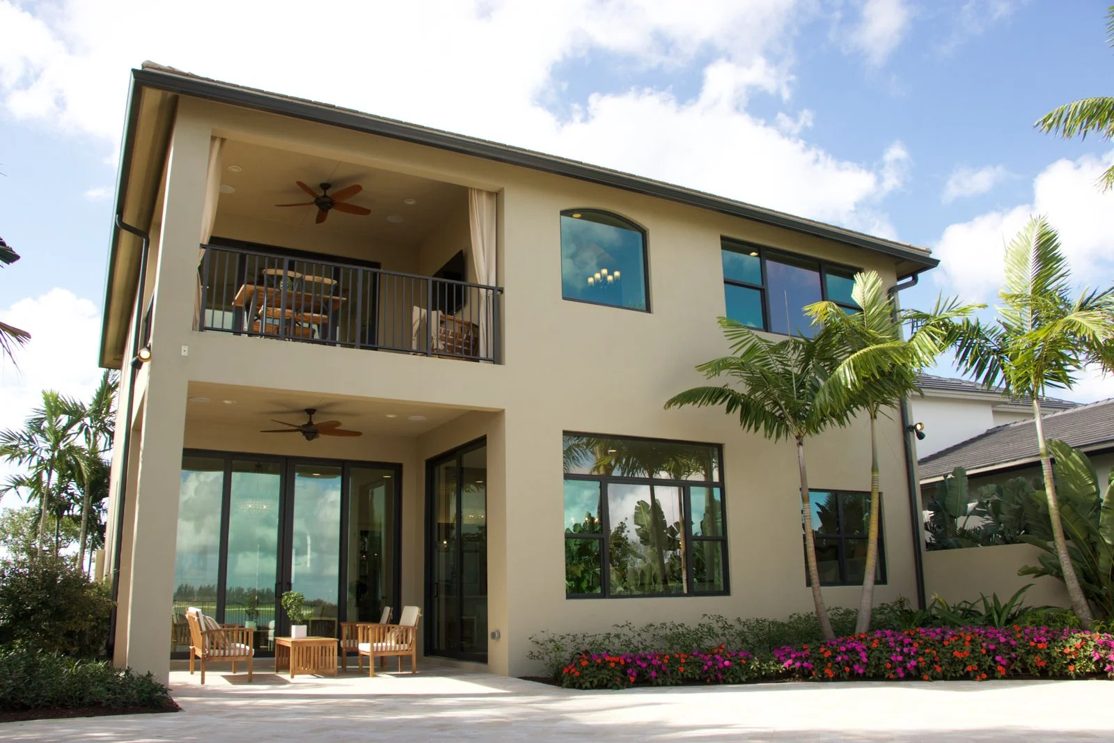 A Florida home with a landscaped yard and covered patio